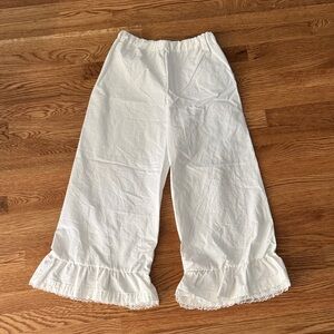 White cotton Ruffle Hem Pillowcase Pants, handmade by brand Junk Drawer size XS